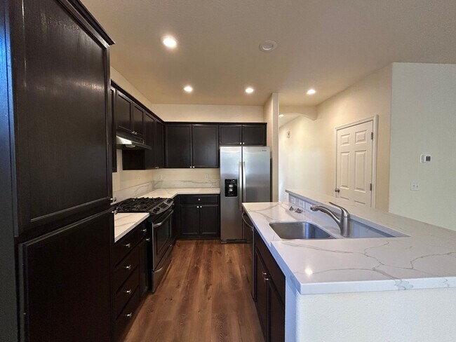 Building Photo - Spacious 4 Bedroom (plus den), 3 Bath Home...