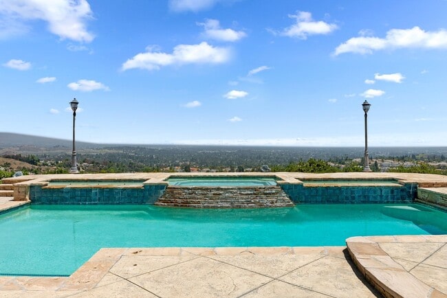 Building Photo - A Private Hillside Haven with Sweeping Val...