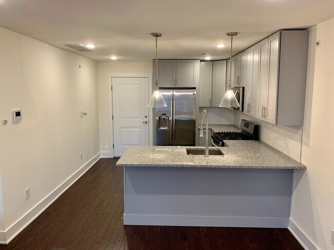 Building Photo - Stunning 2-Bed Condo with Private Roof Deck in Norris Square! Available mid-July!