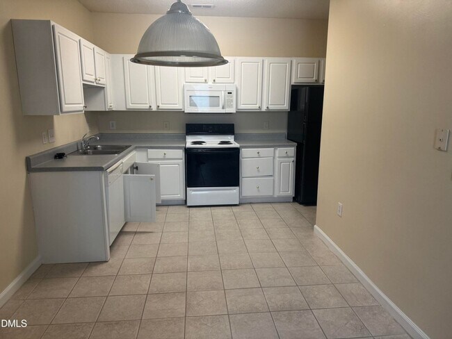 Building Photo - Special Rate! SPACIOUS 1 Bed 1.5 Bath Condo with Sunroom and AMENITIES!!!
