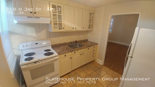 Building Photo - Efficiency Apartment with Off-street Parking