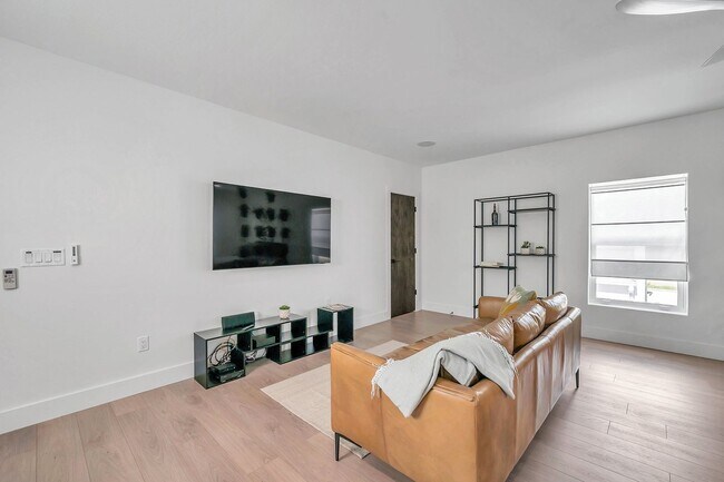 Building Photo - Luxury Living in Grand Central District: Exquisite Furnished Home with Pool