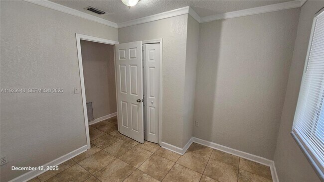 Building Photo - 1040 N 70th Ave