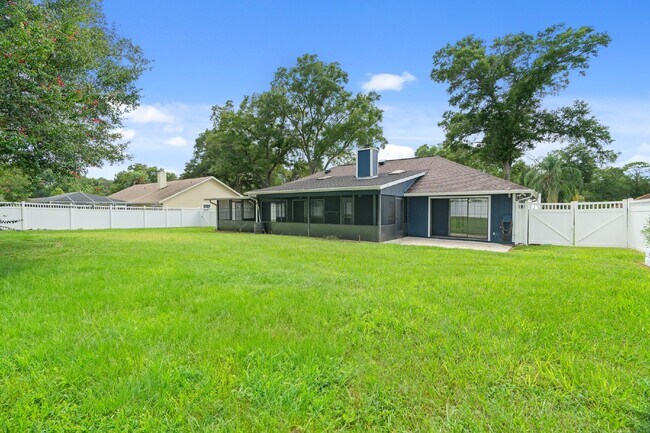 Building Photo - **Available February 2026***Welcome Home :: 3/2 with oversized fenced backyard in Indian Pines!
