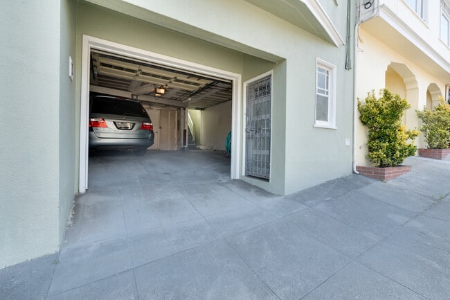 Garage fits two cars depending on size of each car - 1466 14th Ave