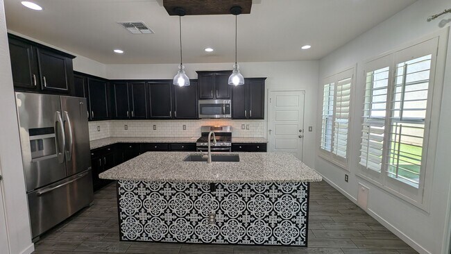 Building Photo - 3 Bedroom Home in the Mulberry Community Near S Signal Butte Rd and E Guadalupe Rd!