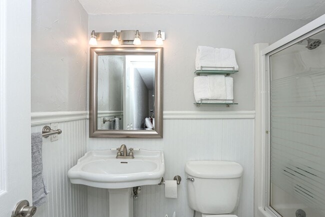 Building Photo - Walk to everything! Partially Furnished! Flexible lease terms!