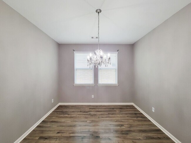 Building Photo - Welcome to this charming one-story home fe...