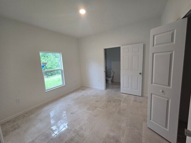 Building Photo - BRAND NEW 2/2/1 -SW LEHIGH ACRES