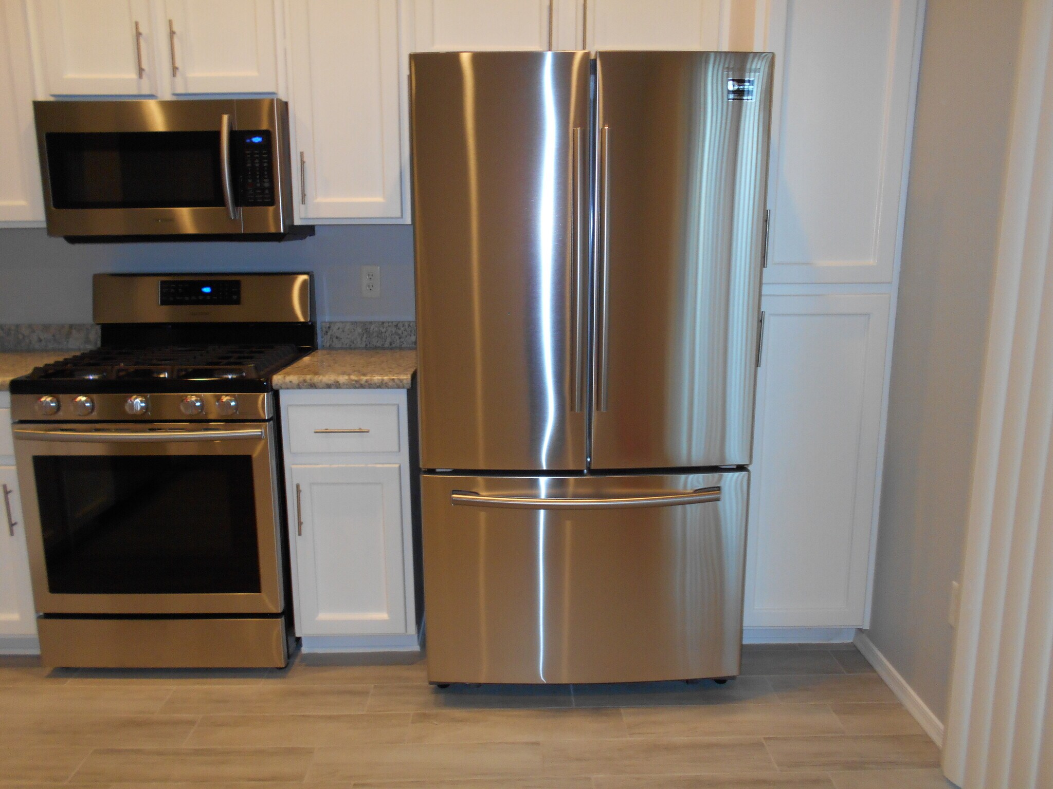 Kitchen w/ new refrigerator - 1379 Forlana Dr