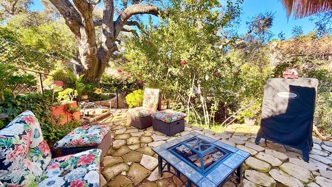 Building Photo - Darling Open Studio Layout Guest Home unit on Lush and Beautifully Landscaped Private Property in...