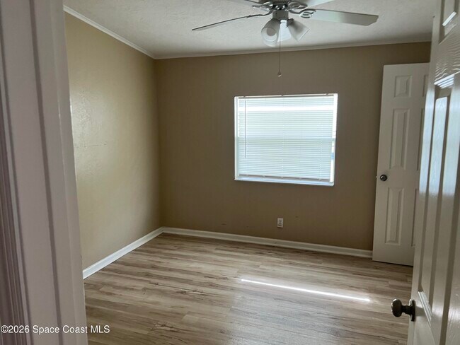 Building Photo - 2395 Coconut Palm Dr