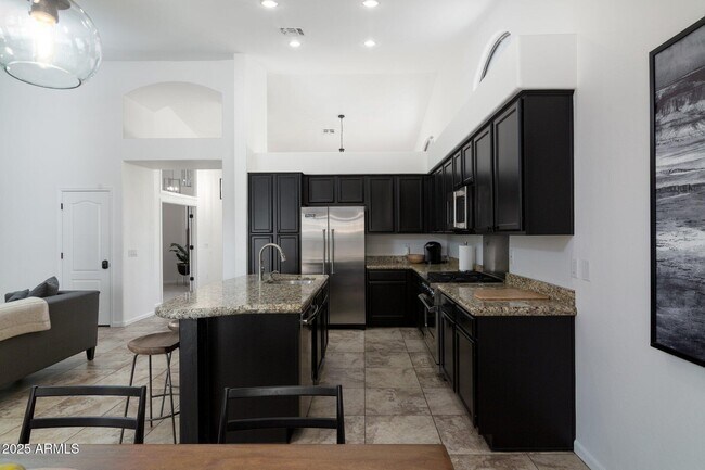 Building Photo - 6785 E Evans Dr