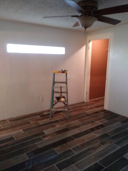 Tile floor in bedroom - 355 Olive St