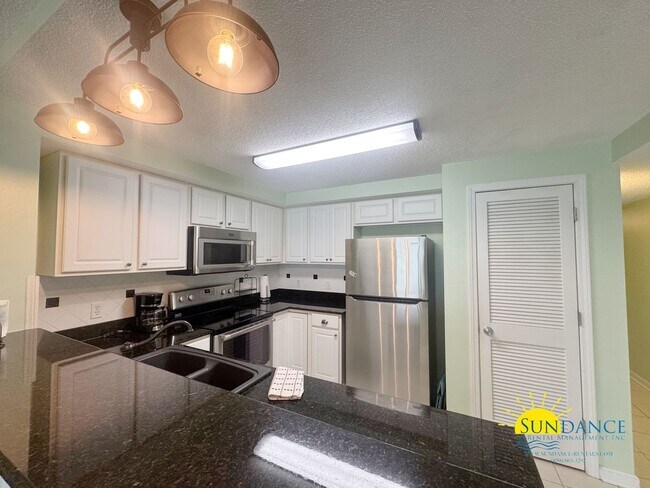 Building Photo - FURNISHED waterfront condo in Desirable In...