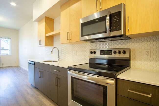 Building Photo - SUMMER SPECIAL: Top Floor Modern 2 Bdr w/ W&D + AC!