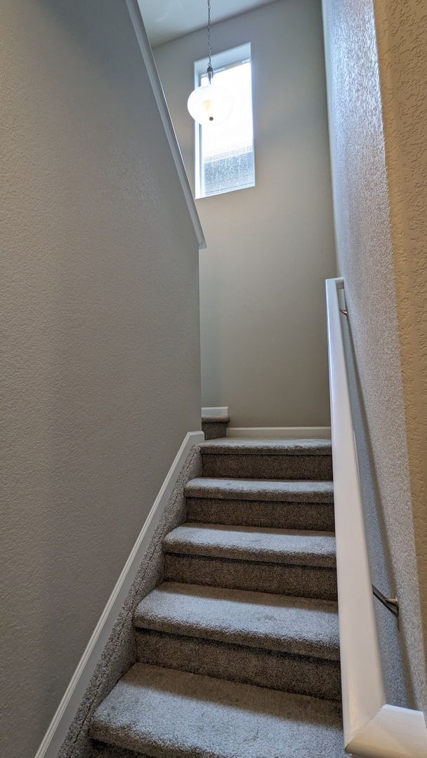 Building Photo - NEWER END UNIT TWO STORY TOWNHOME WITH A/C...