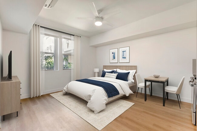 Renovated Package II living and dining area with hard surface flooring - Avalon Wilshire