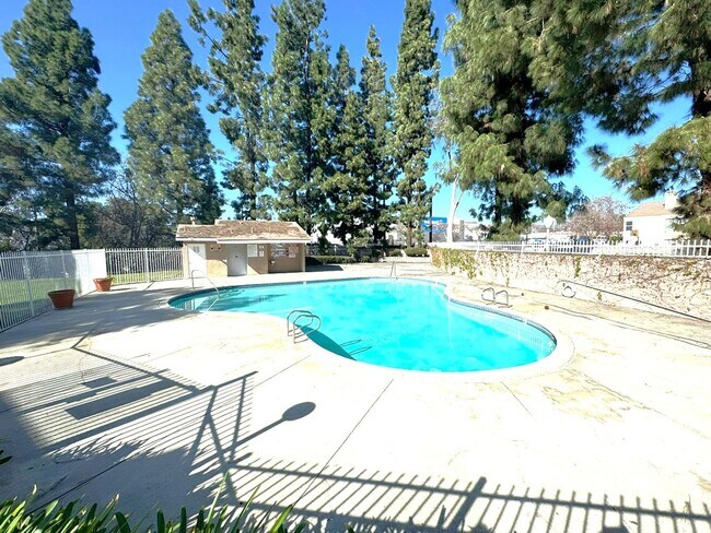 Building Photo - 2 Bedroom, 2 Bath Upstairs Condo with Private Balcony & 2-Car Garage, Gated Community, Water/Tras...
