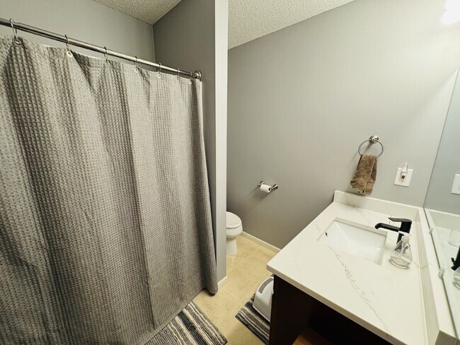 Building Photo - Spacious 4-Bed Shakopee Gem with Granite Finishes & Finished Basement