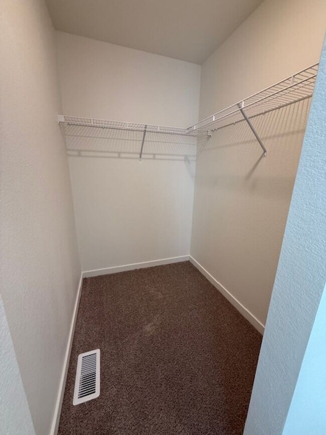 Building Photo - New 2 Bedroom Townhome + 2 Car Garage