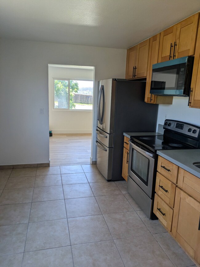 Building Photo - **Spacious 4-Bedroom, 2-Bath Residence with Waterfront & Hillside Views – Vallejo**