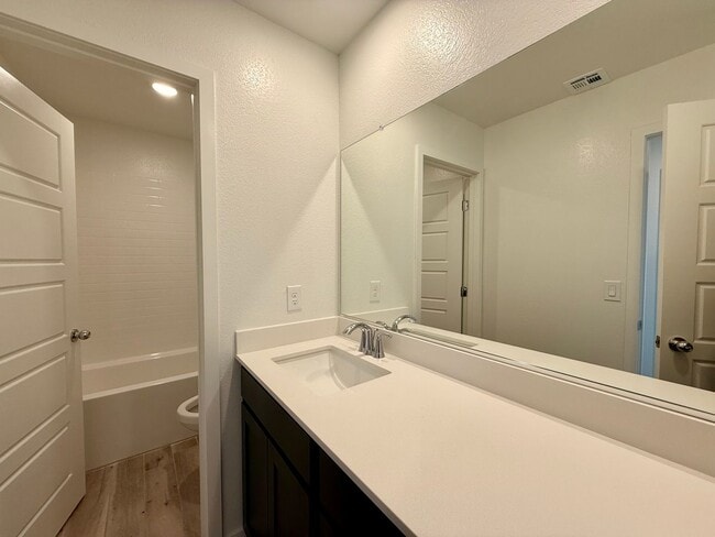 Building Photo - 4 BED 3 BATH 2 CAR GARAGE TOWNHOUSE + LOFT ON CORNER LOT w/ BALCONY