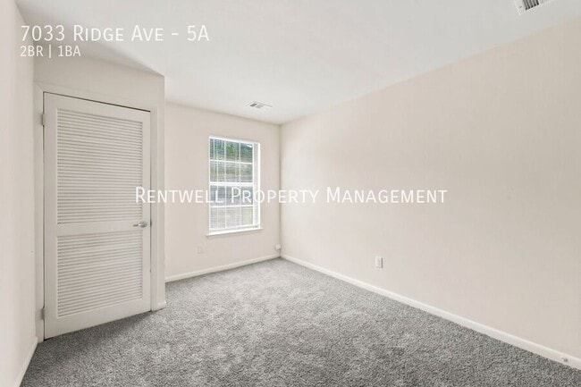 Building Photo - 7033 Ridge Ave