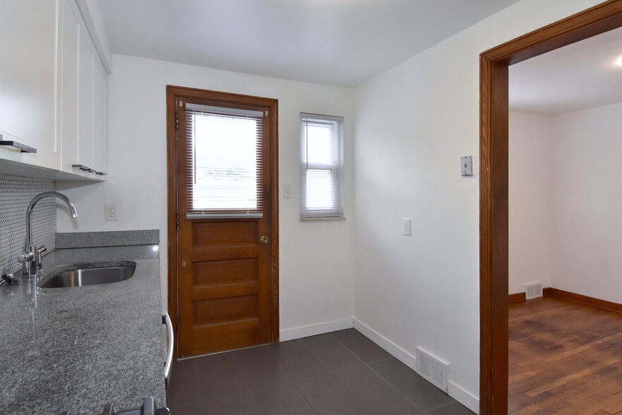 Spacious kitchen has extra space for storage or open shelving. - 31 Marylea Ave