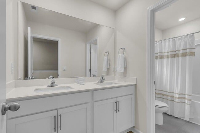 Building Photo - Come experience this beautiful new home and community for yourself.