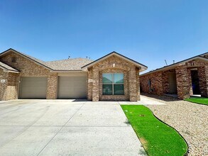 Building Photo - Stylish and Modern 3-Bedroom Duplex for Re...