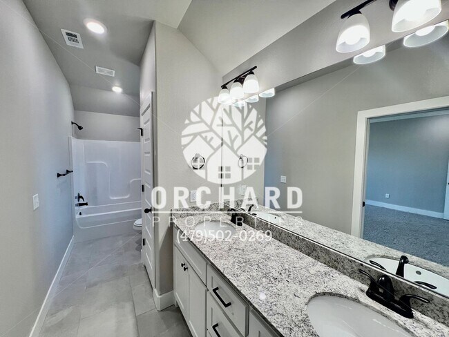 Building Photo - Single Family Home - Open-Concept Cedarwoo...