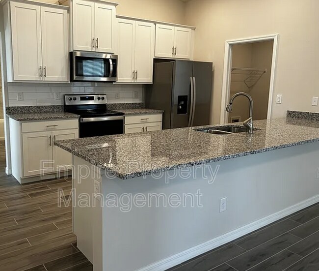 Building Photo - 4 Bedroom 2 bathroom 3 Car Garage NE Cape ...