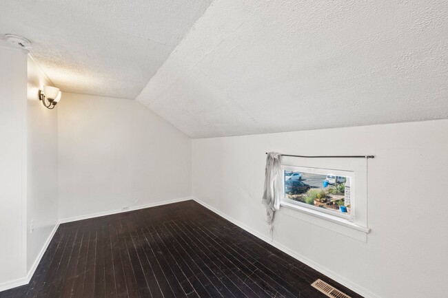 Building Photo - 1/2 Month Free! Storybook Farmhouse - Updated Kitchen, A/C, Basement, Fenced Yard, Garage, Laundr...