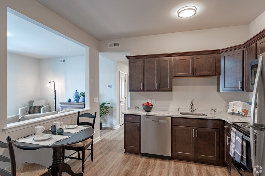 2BR, 1BA - 912SF - Kitchen and Dining Area - Homestead Senior Apartments