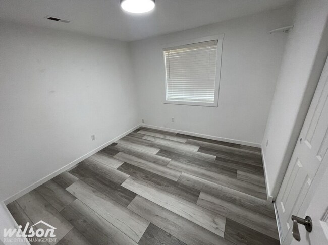Building Photo - 3 Bed, 2 Bath Home with a Two-Car Garage, Fenced Backyard, and Lawn Care Included
