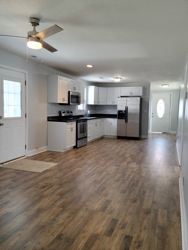 Kitchen w/ appliances - 13594 Hamilton St NE