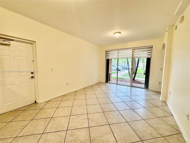 Building Photo - 6520 NW 114th Ave