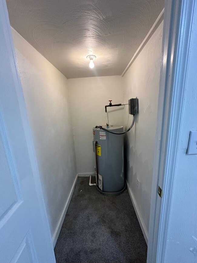 Building Photo - Three Bedroom Available Soon!