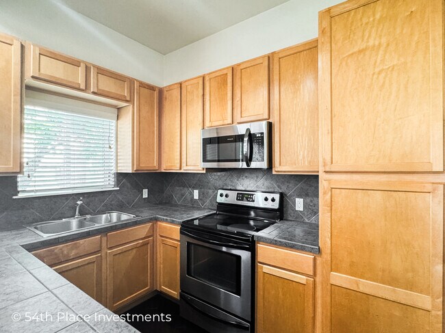 Building Photo - 8229 W 54th Ave