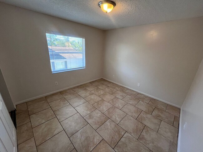 Building Photo - 7108-7108 S Kissimmee St