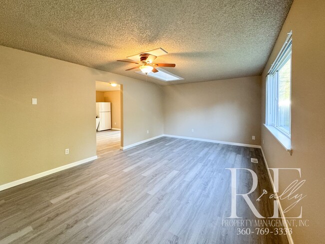 Building Photo - Classic Character Meets Fresh Flooring in ...