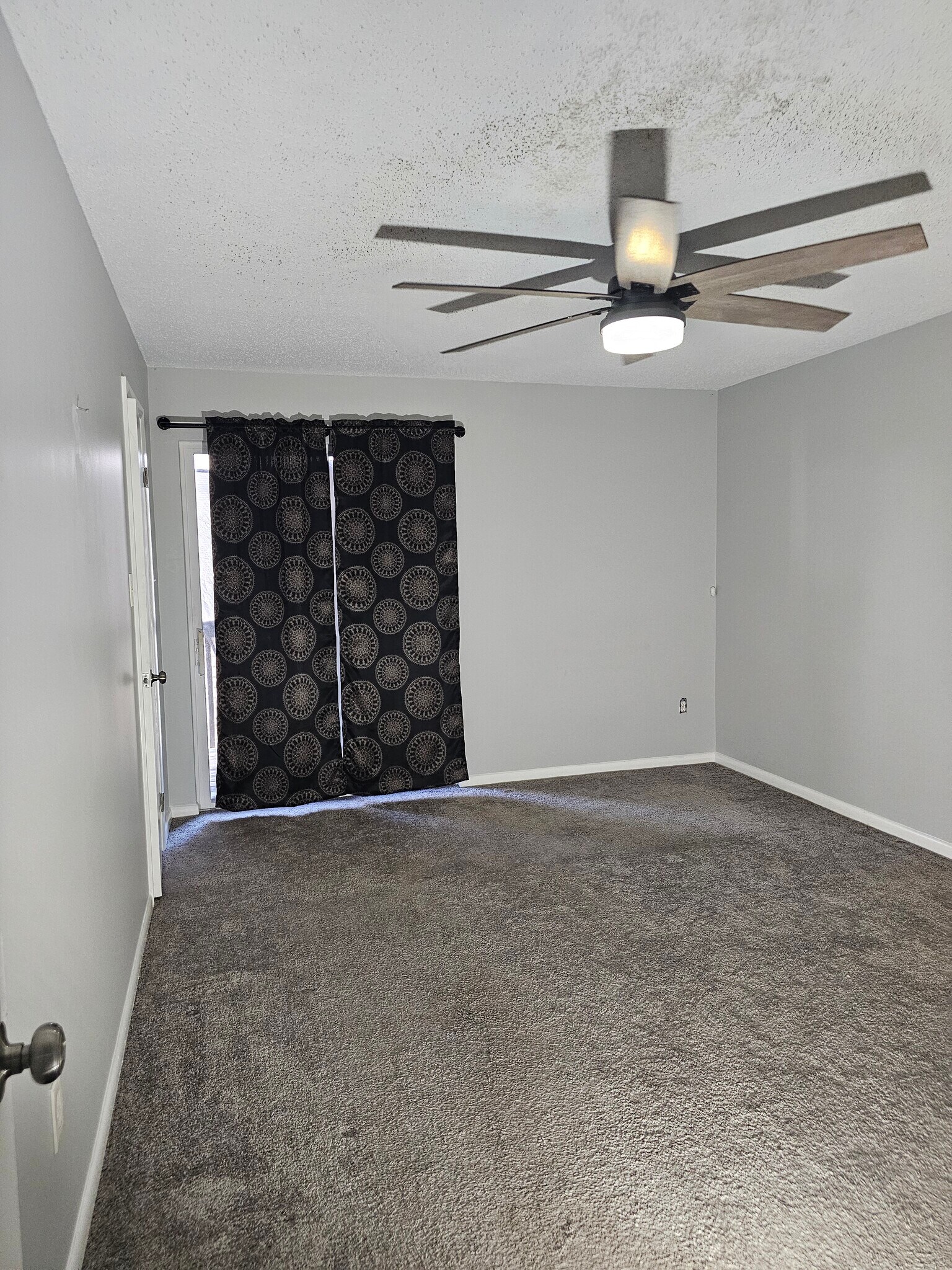 Master bedroom with a walk-in closet, a full bathroom in the room. - 8582 Chesapeake Blvd