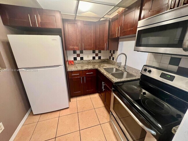 Building Photo - 2800 NW 56th Ave