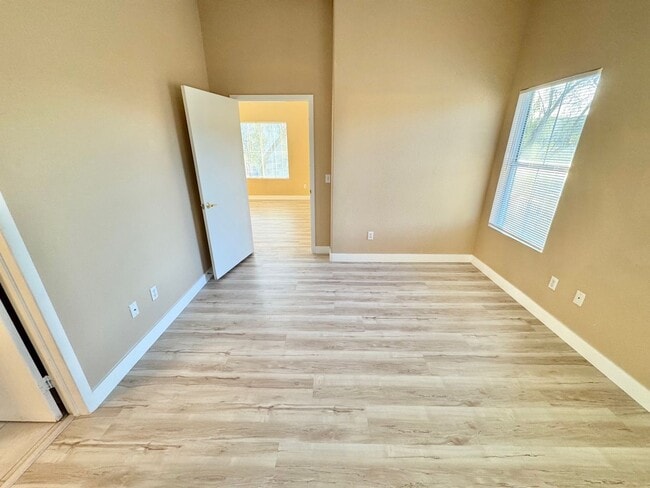 Building Photo - Welcoming 2 Bedroom home with private balcony located in South Las Vegas Community