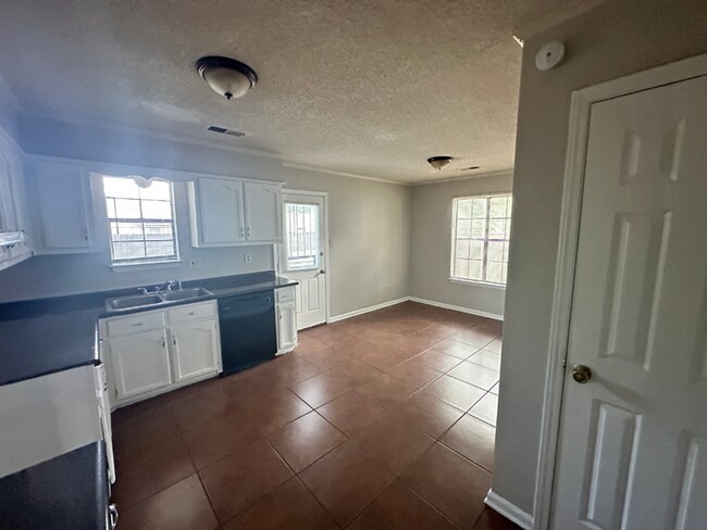 Building Photo - MOVE-IN READY! 3BR/2BA in Quiet Cove | Brick Fireplace | Fenced Yard & Patio!