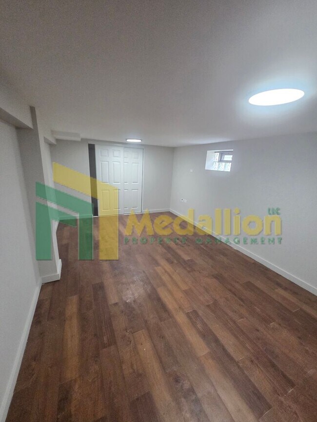 Building Photo - Spacious 6-Bedroom Home with Finished Basement and Backyard
