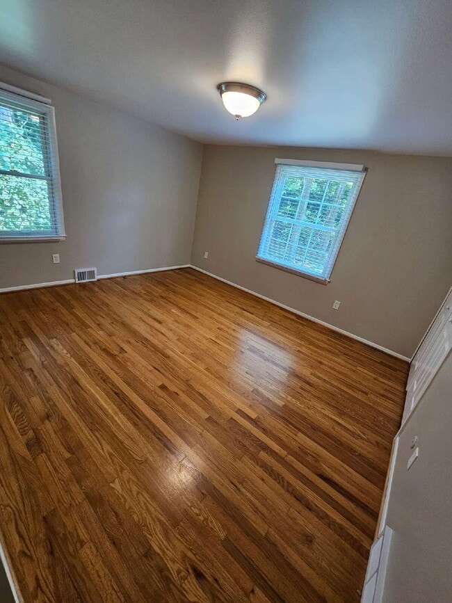 Building Photo - Private 4 Bedroom Home on 0.75 Acres with Great Room Fireplace, Wet Bar & 3-Season Room, 2 Car At...