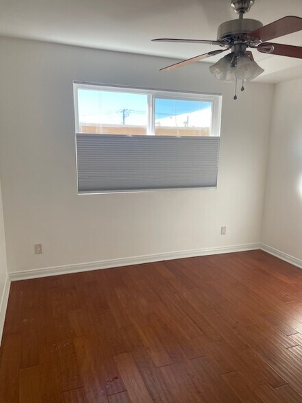 1st bedroom window - new up/down blackout blinds - 5722 Riley St