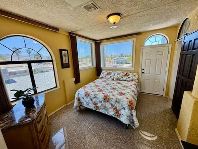 Building Photo - 3 Story Beauty on the Colorado River w/Private Dock